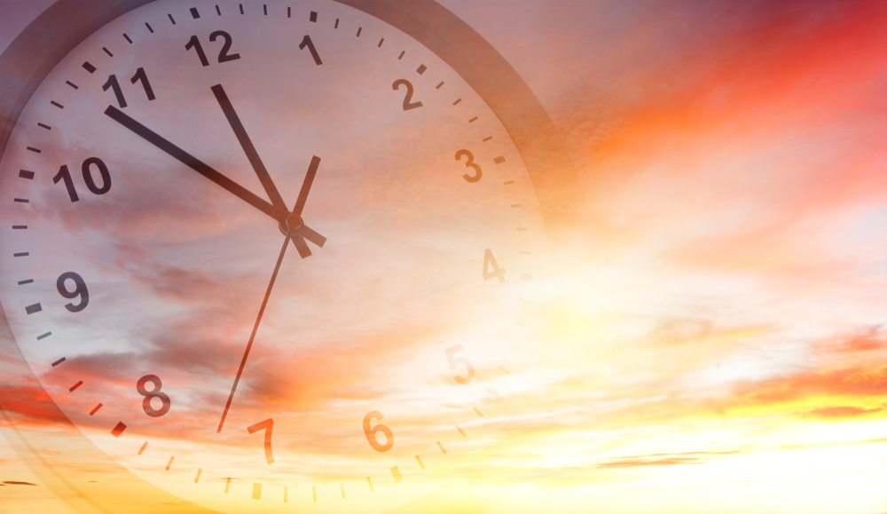 Clock,Face,In,Bright,Sky.,Time,Passing