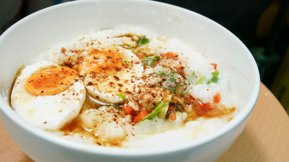 Salted,Duck,Egg,On,Rice,Congee